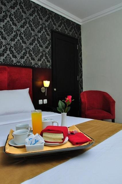 Feodora Airport Hotell Palembang Rum bild
