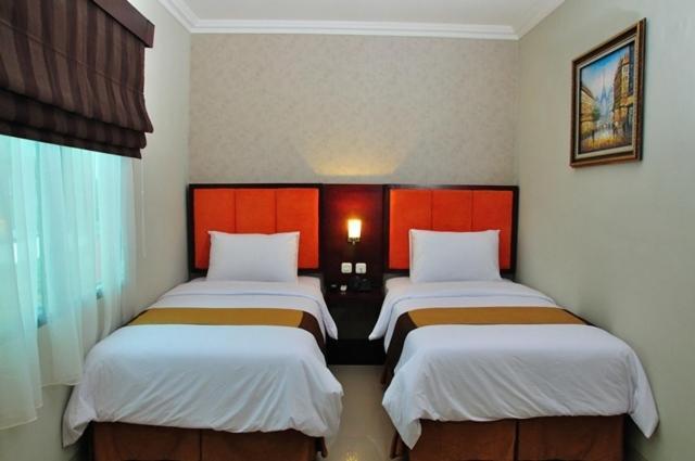 Feodora Airport Hotell Palembang Rum bild